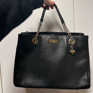 Black Kate spade purse with gold chain details. Leather and great condition.